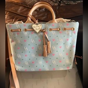 Vintage Dooney and Bourke light blue with pink heart tassel bag. NWT.